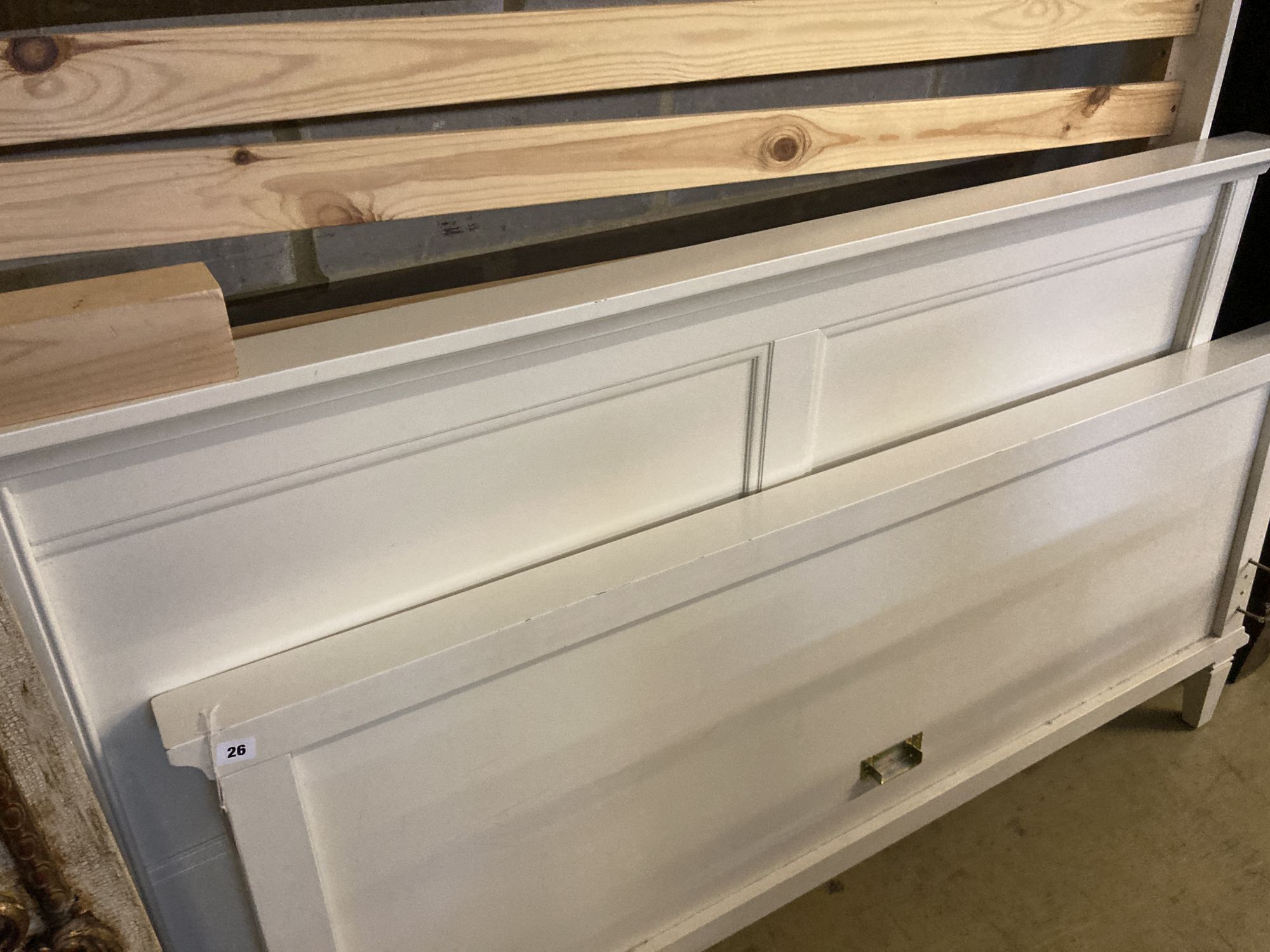 A contemporary white painted five foot bedframe, headboard height 102cm
